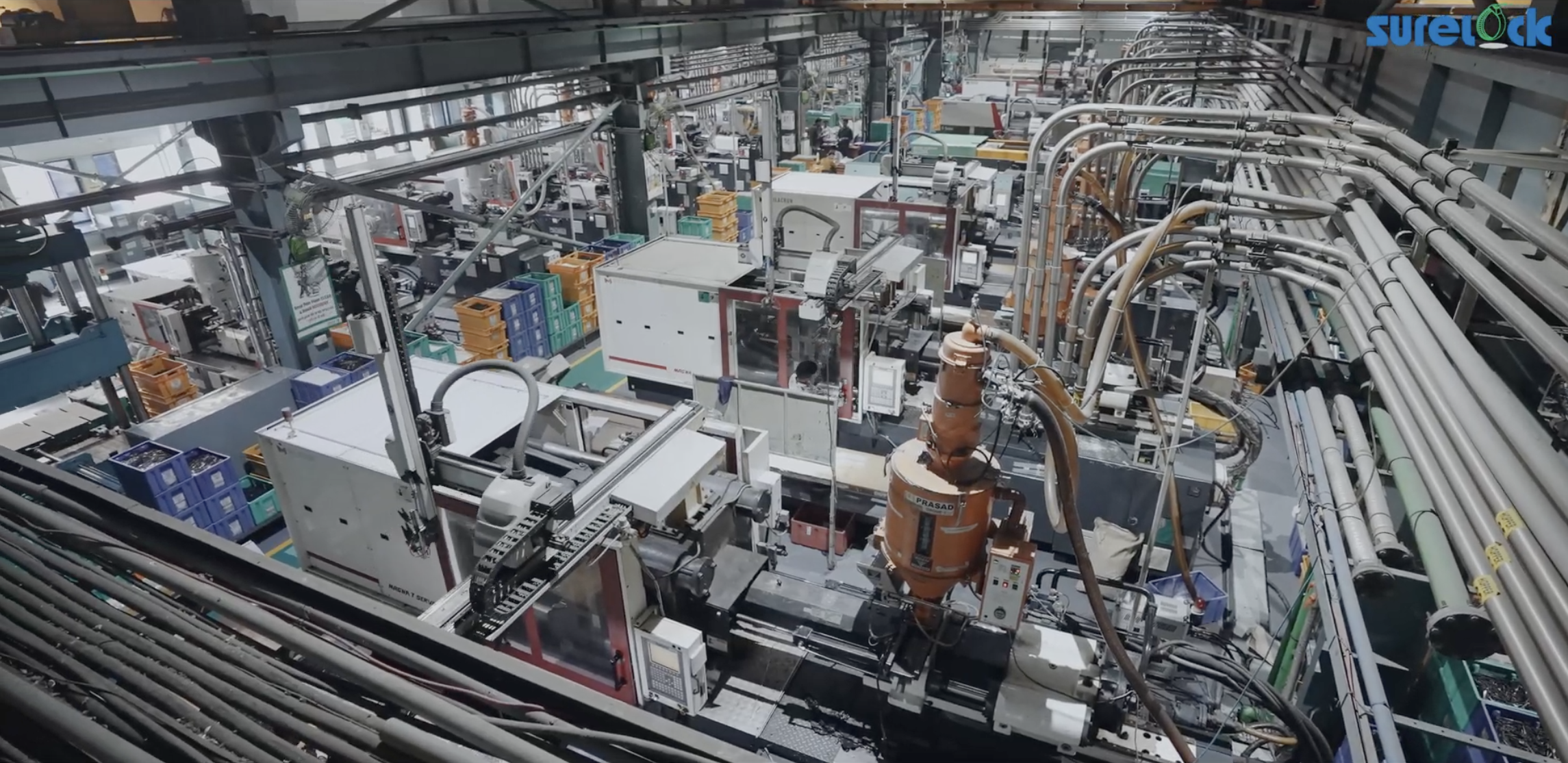 Modern manufacturing facility with injection molding machines and automated production lines for cable ties#1.8