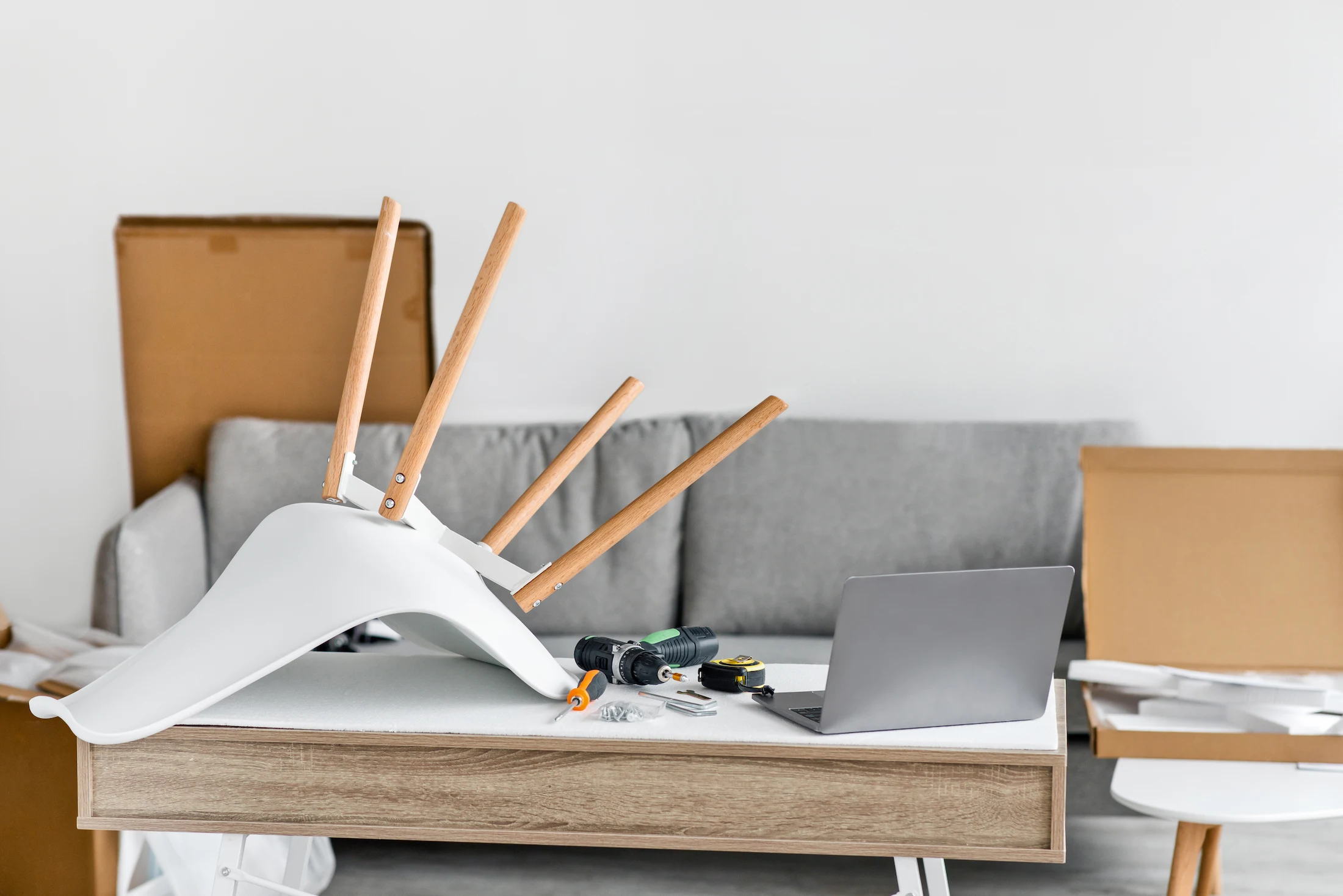 chair fixing on coffee table in living room