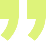 Green double quotation marks symbol on white background.