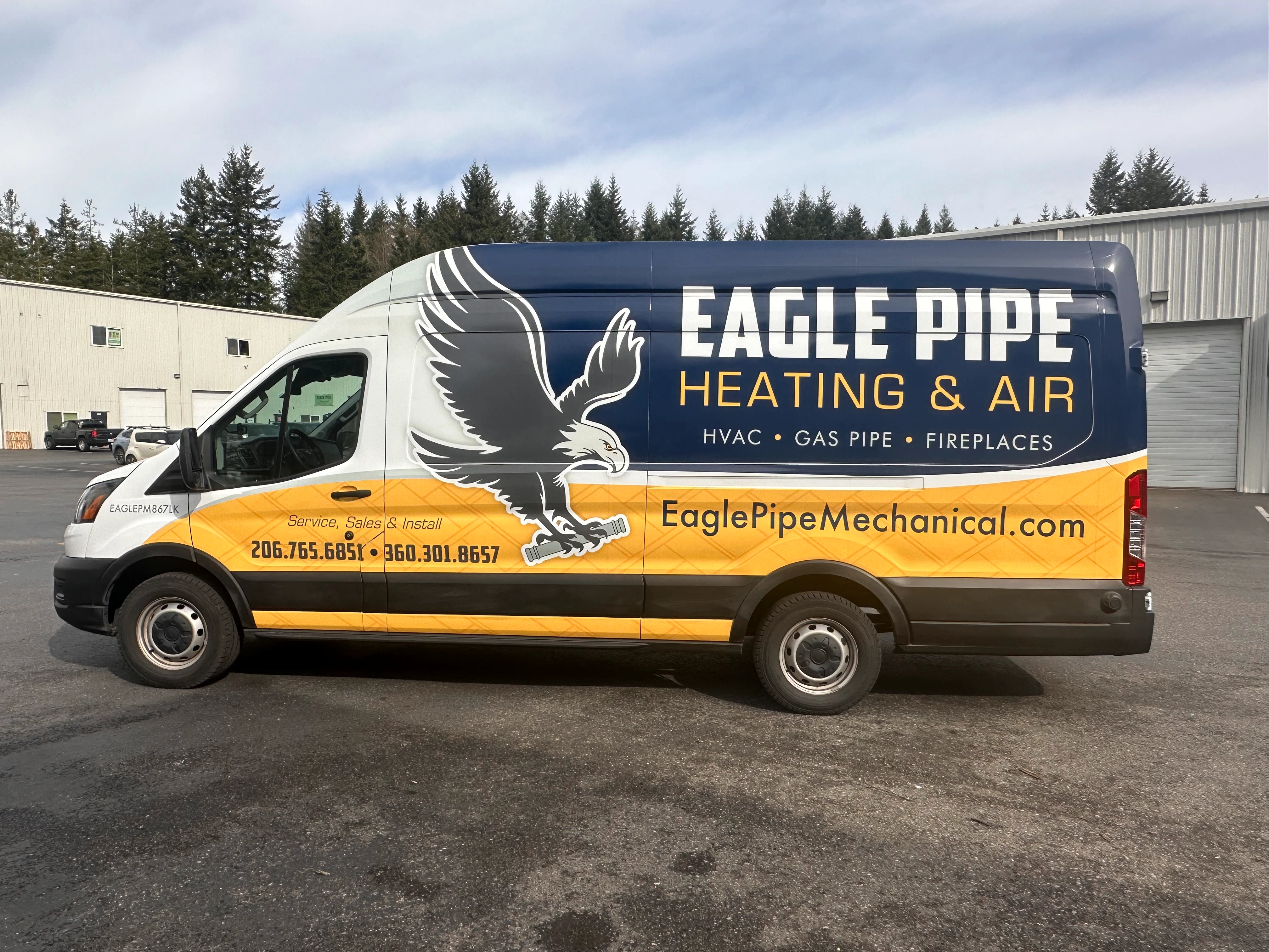 Van with "Eagle Pipe Heating & Air" logo on a blue and yellow background. Features eagle graphic.