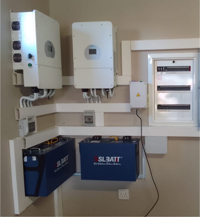 a white electrical boxes and wires