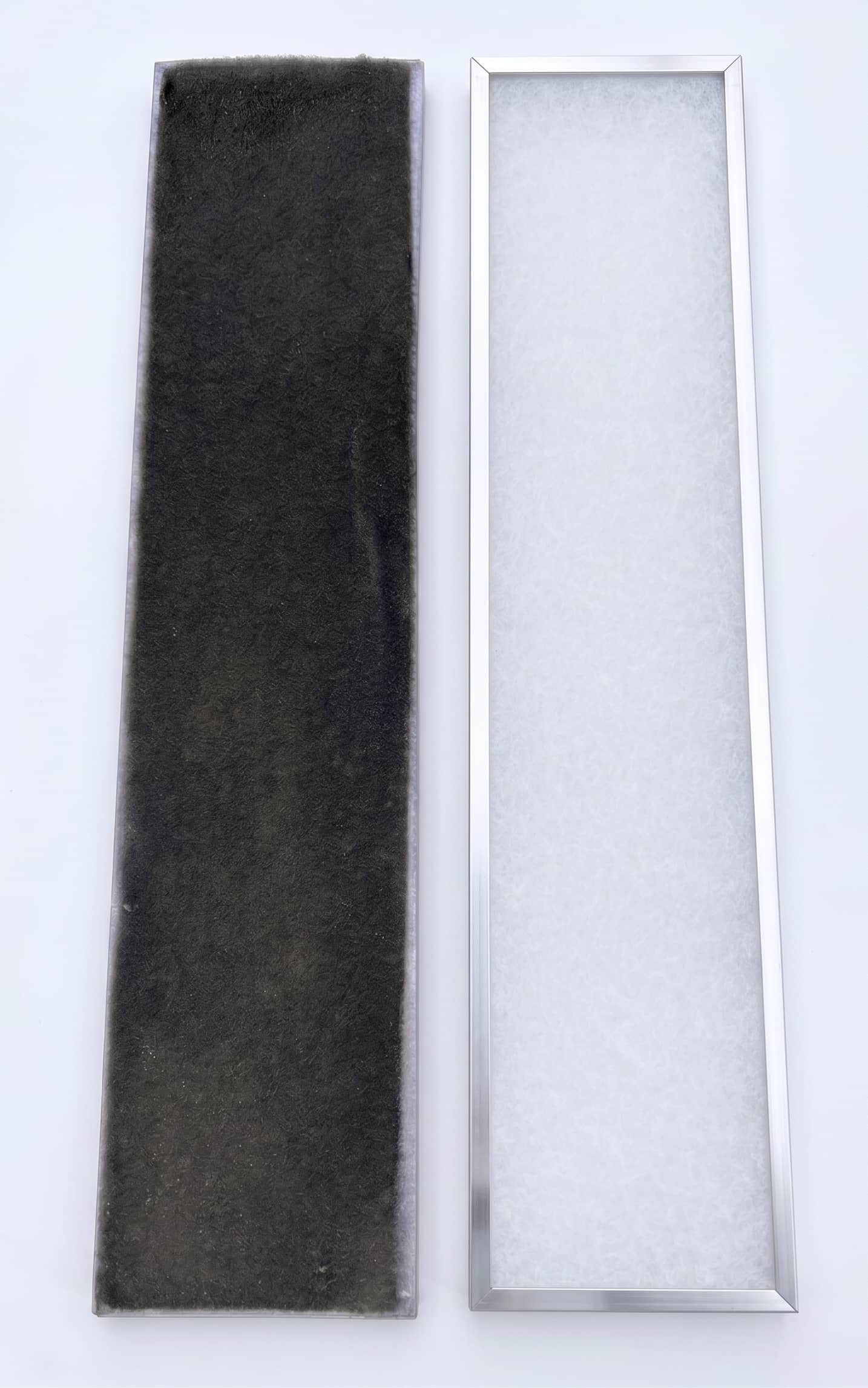 Side-by-side comparison of a dirty black air filter and a clean white air filter with metal frames.