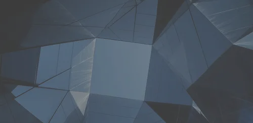 A close up of a building with a sky in the background.