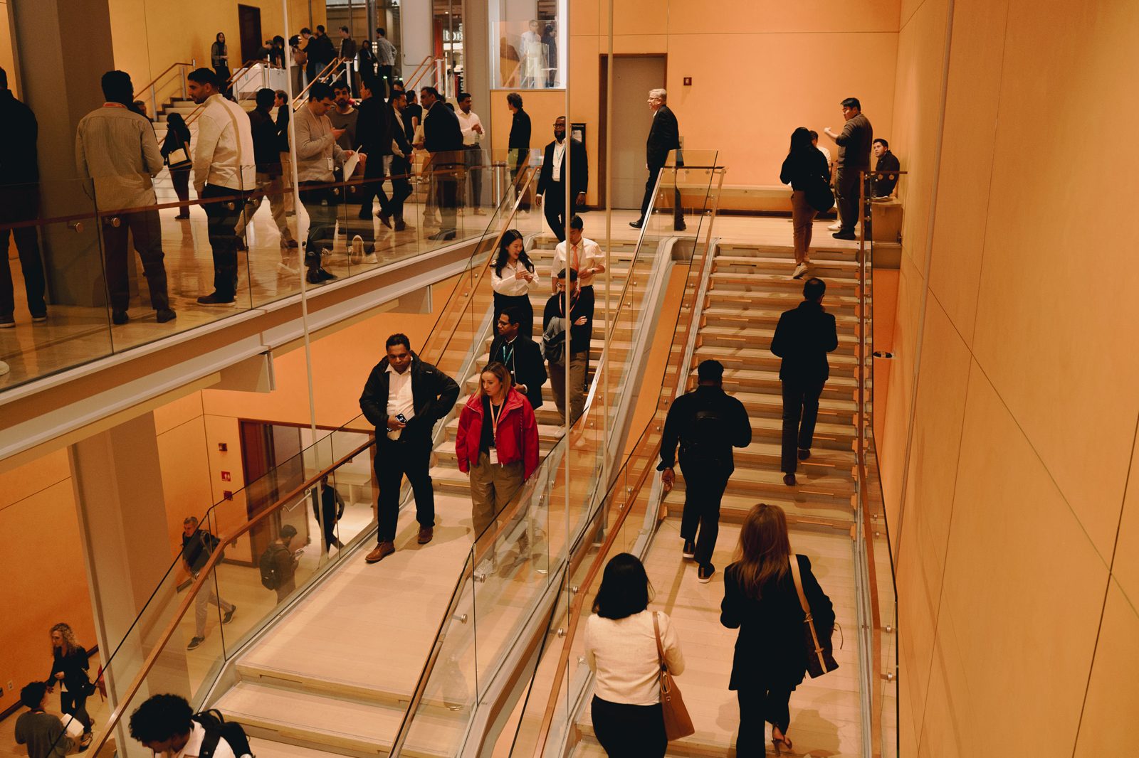 Guests arriving down the Times Center stairs