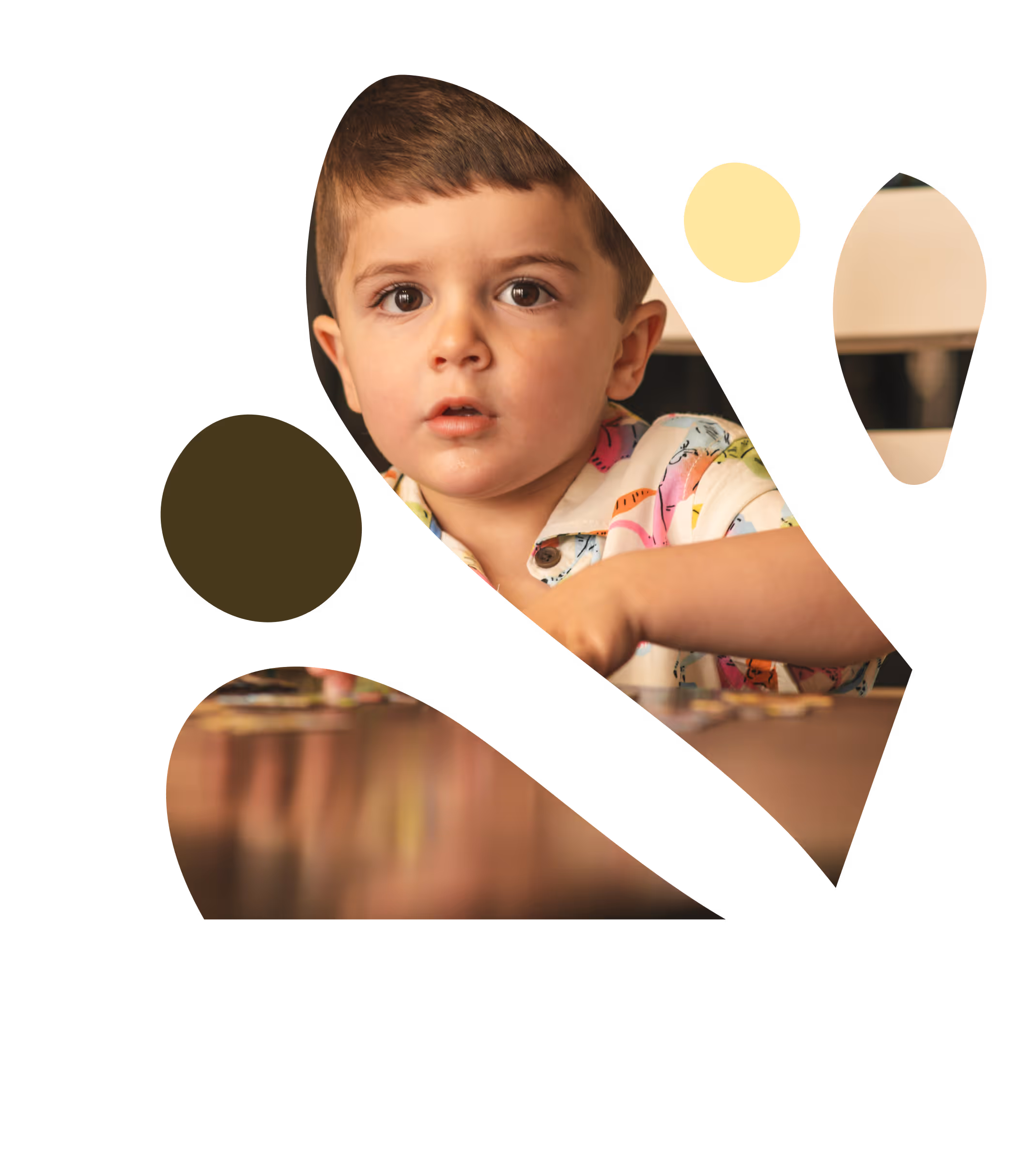 A young girl with blonde hair running joyfully across a grassy field with colorful agility cones, captured in motion with a blurred background