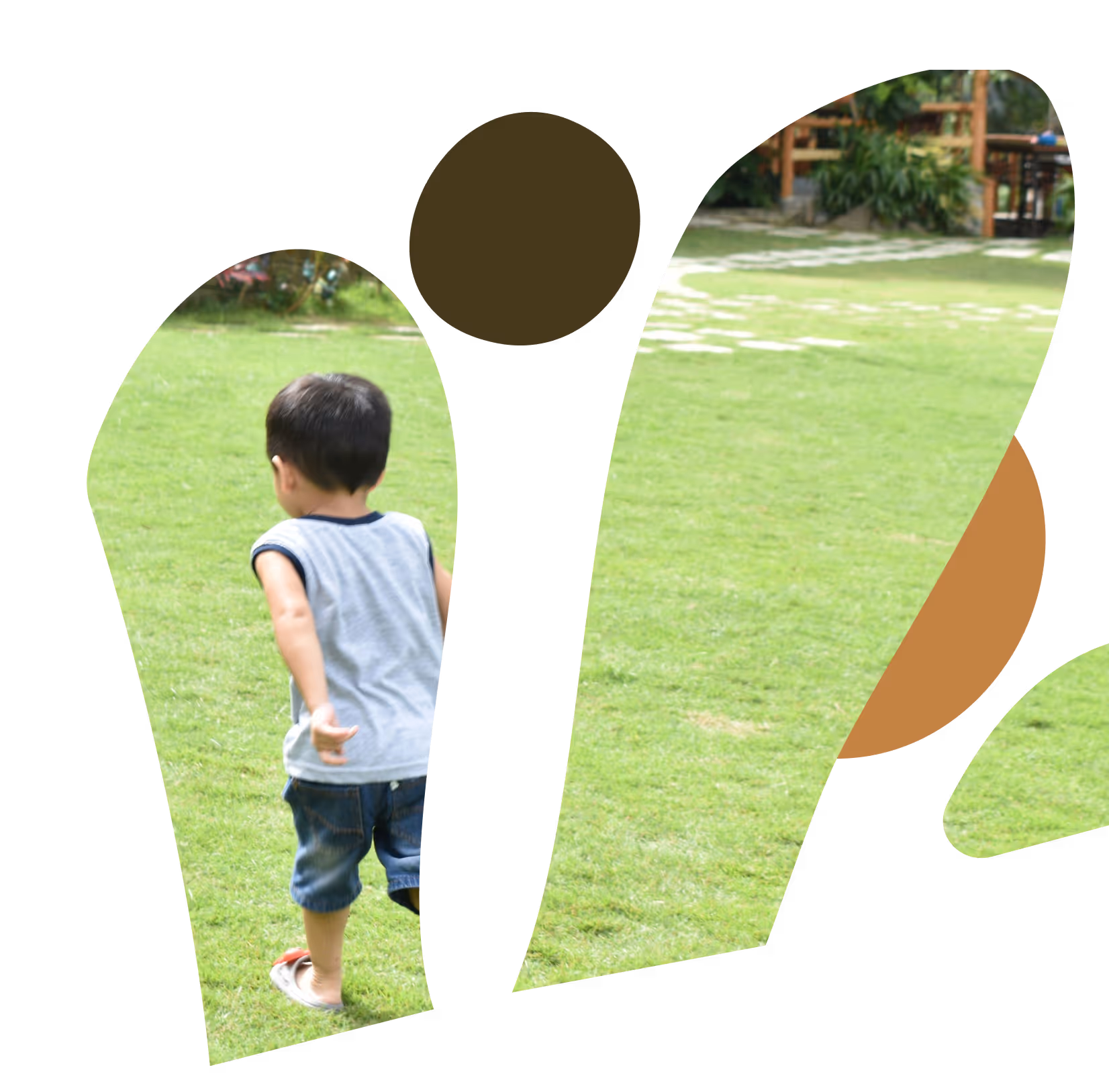 A young girl with blonde hair running joyfully across a grassy field with colorful agility cones, captured in motion with a blurred background