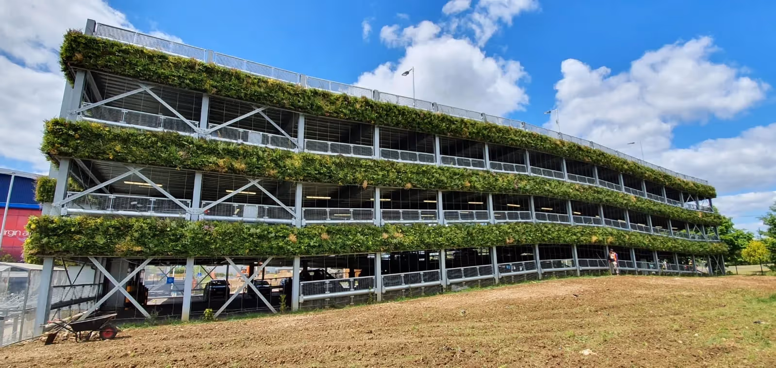 A 300m²+ living wall for a multi-storey car park, grown for 6 months at our nursery, enhancing biodiversity and counteracting pollution.