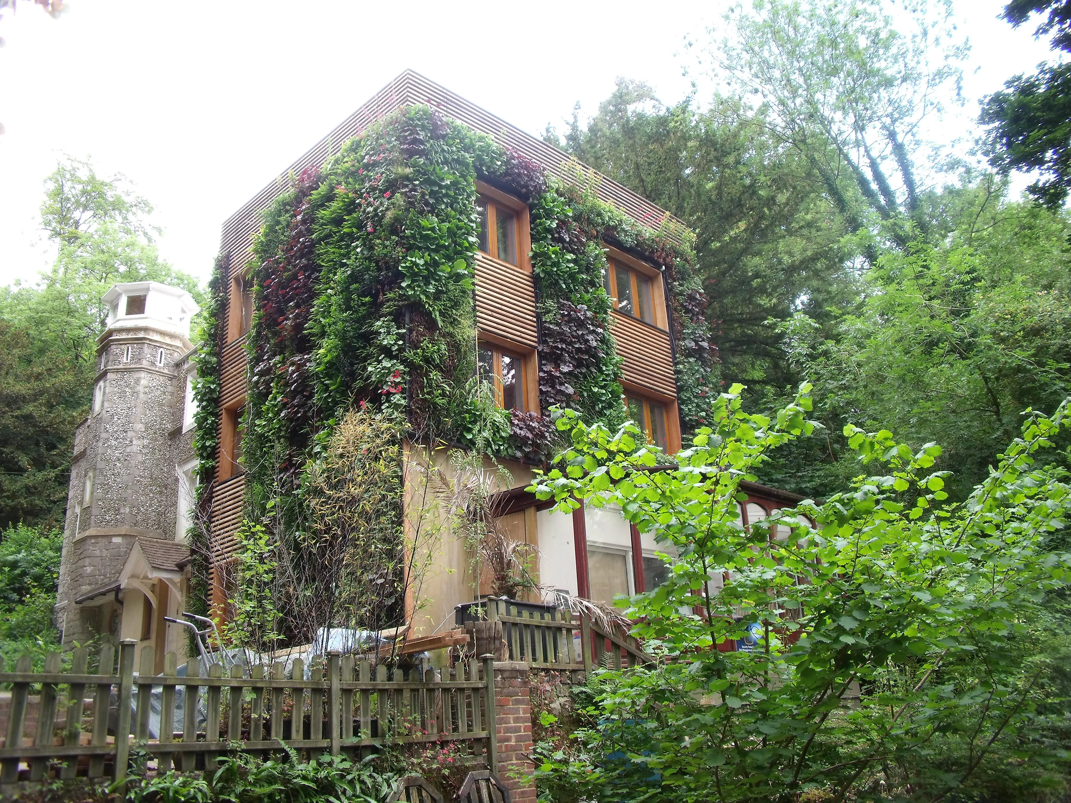 Exterior of residence Castle Keep, with living walls all over the building 