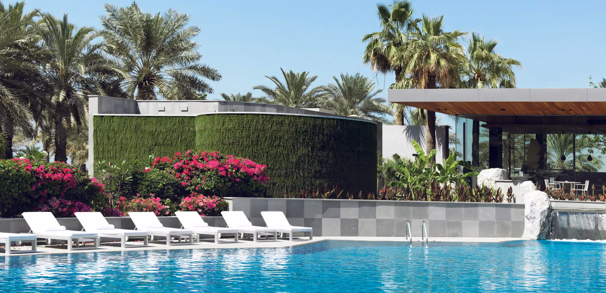 Ritz Carlton Hotel outdoor pool, with living wall feature