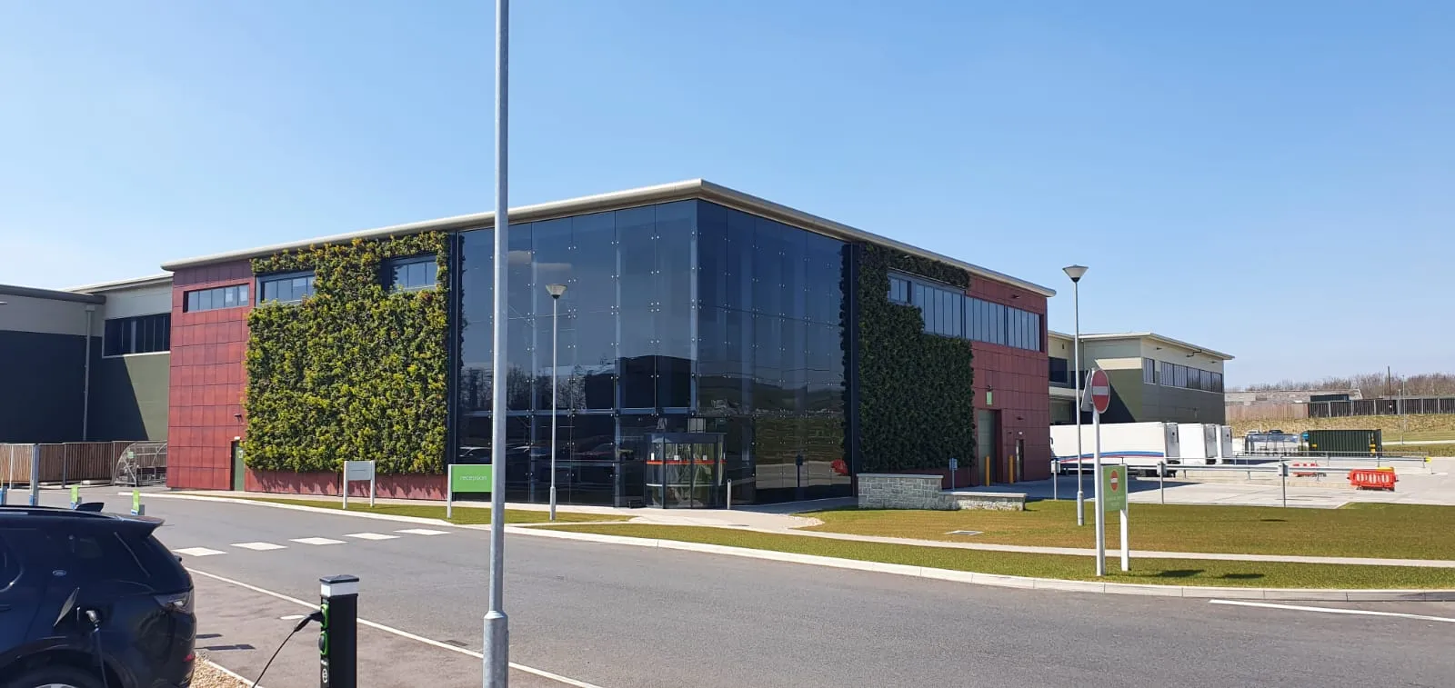 Exterior of Wares farm, a large building with two large living walls