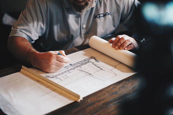 Architect drawing a building design