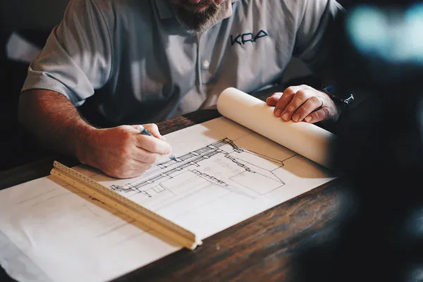 Architect drawing a building design