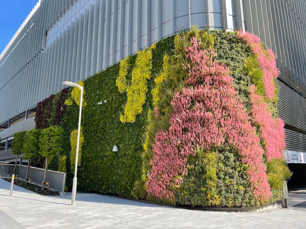 Exterior of Glasshouse MSCP car park, with a living wall wrapped around the corner of the building