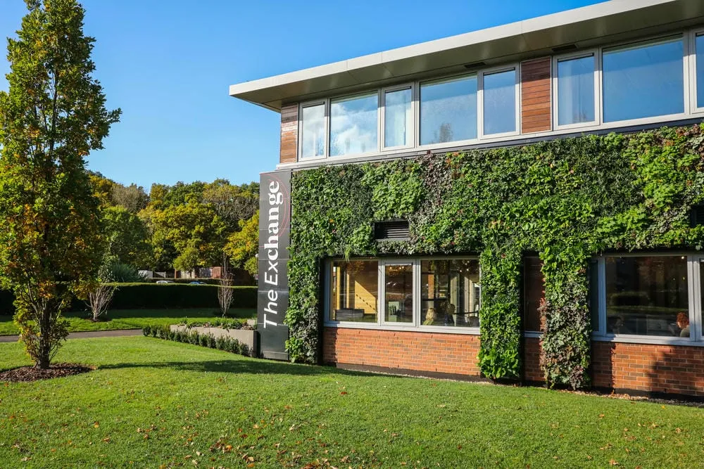 Exterior of The Exchange in Chineham Park, which has a large external living wall on the front of the building 