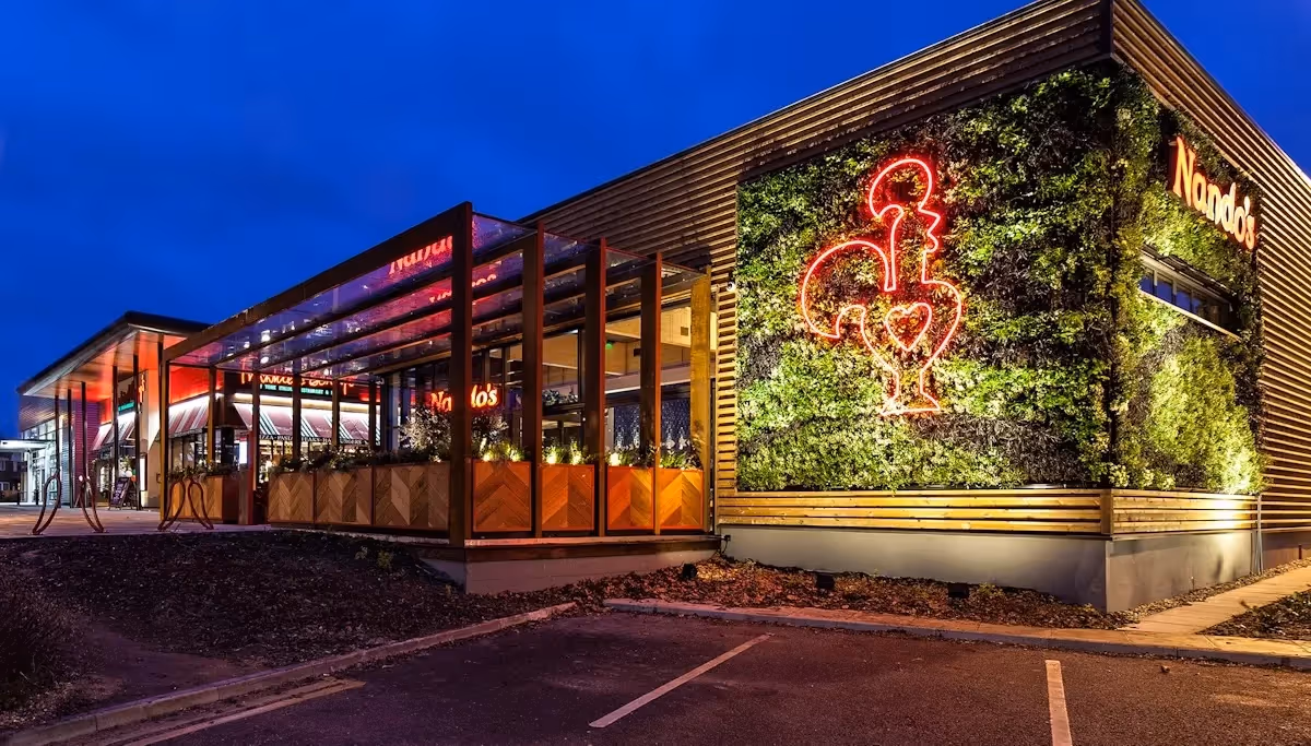 Nando's Cambridge: a striking living wall adds visual impact and a verdant backdrop, creating a huge living billboard for their brand.