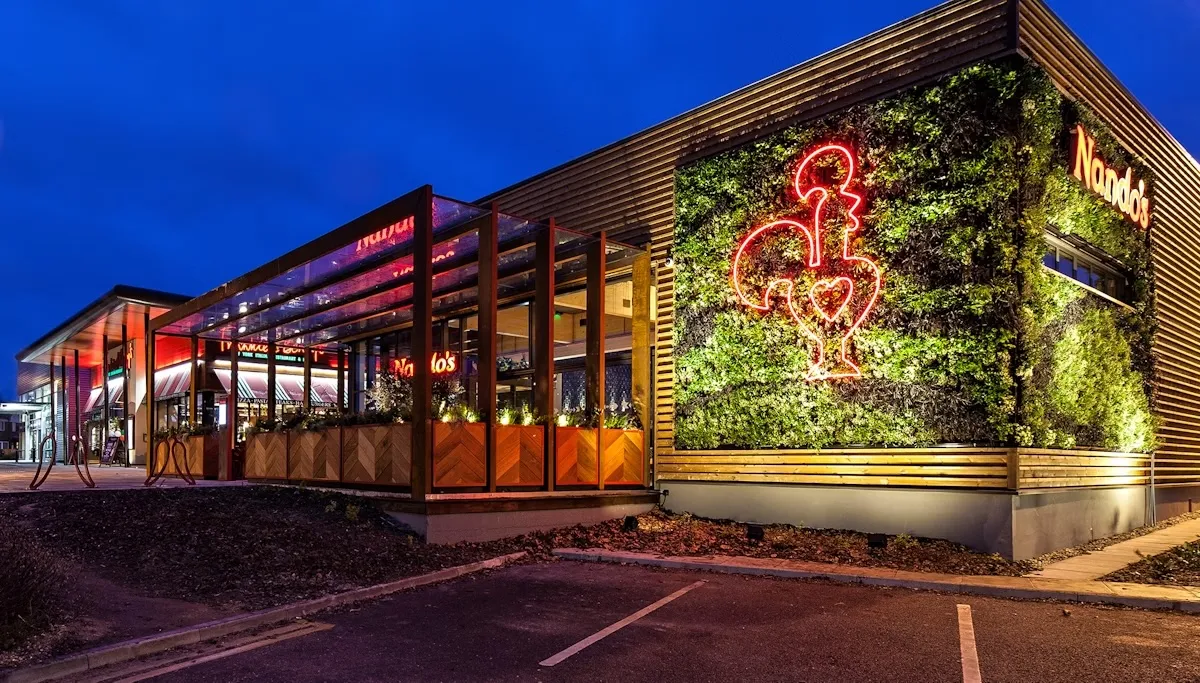 Nando's Cambridge: a striking living wall adds visual impact and a verdant backdrop, creating a huge living billboard for their brand.