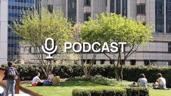 Trees and grass in the background with the word "Podcast" in the foreground