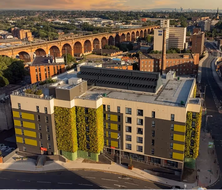 Birdseye view of The Mailbox building in stockport and it's living wall facade