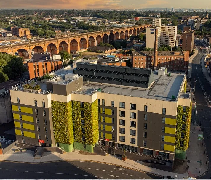 Birdseye view of The Mailbox building in stockport and it's living wall facade