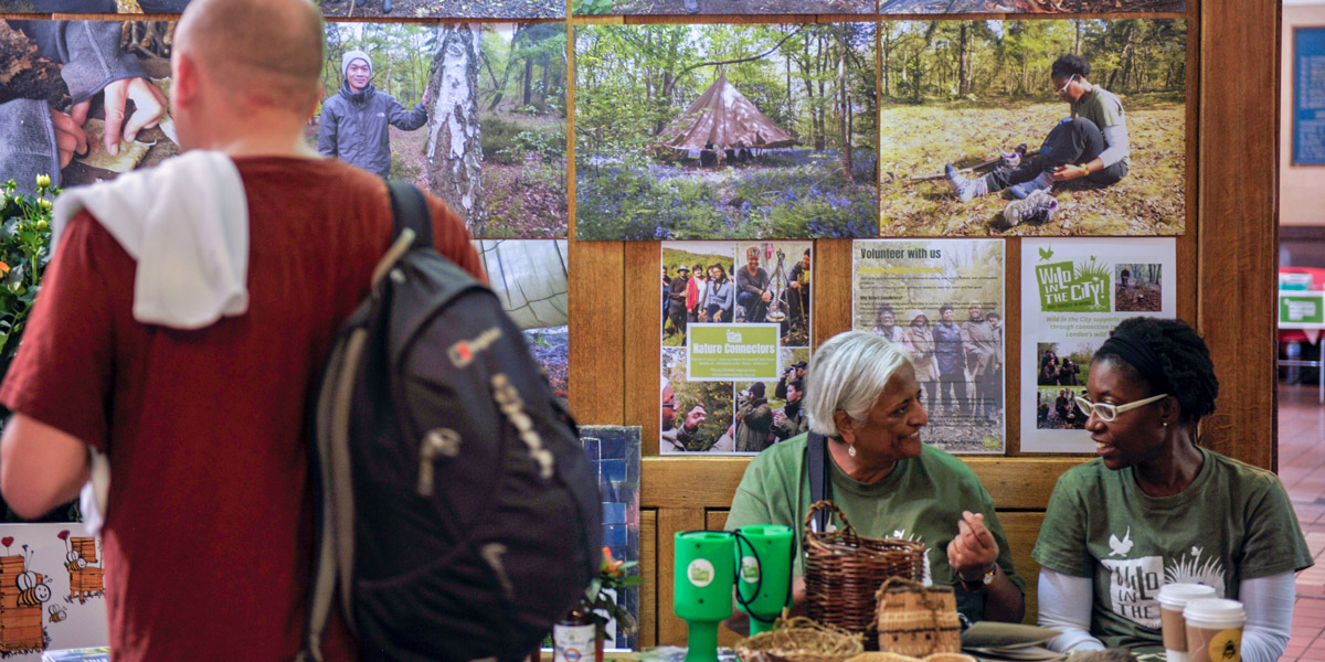 People in front of nature imagery