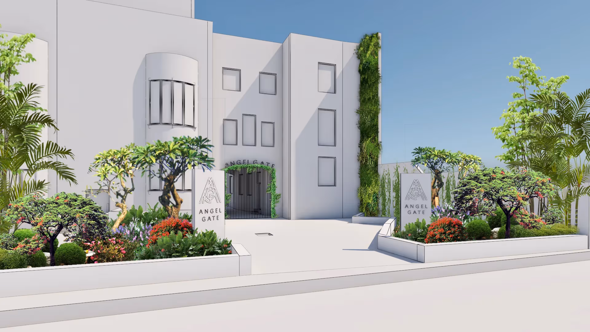 Modern white Angel Gate building with lush green landscaping and entrance