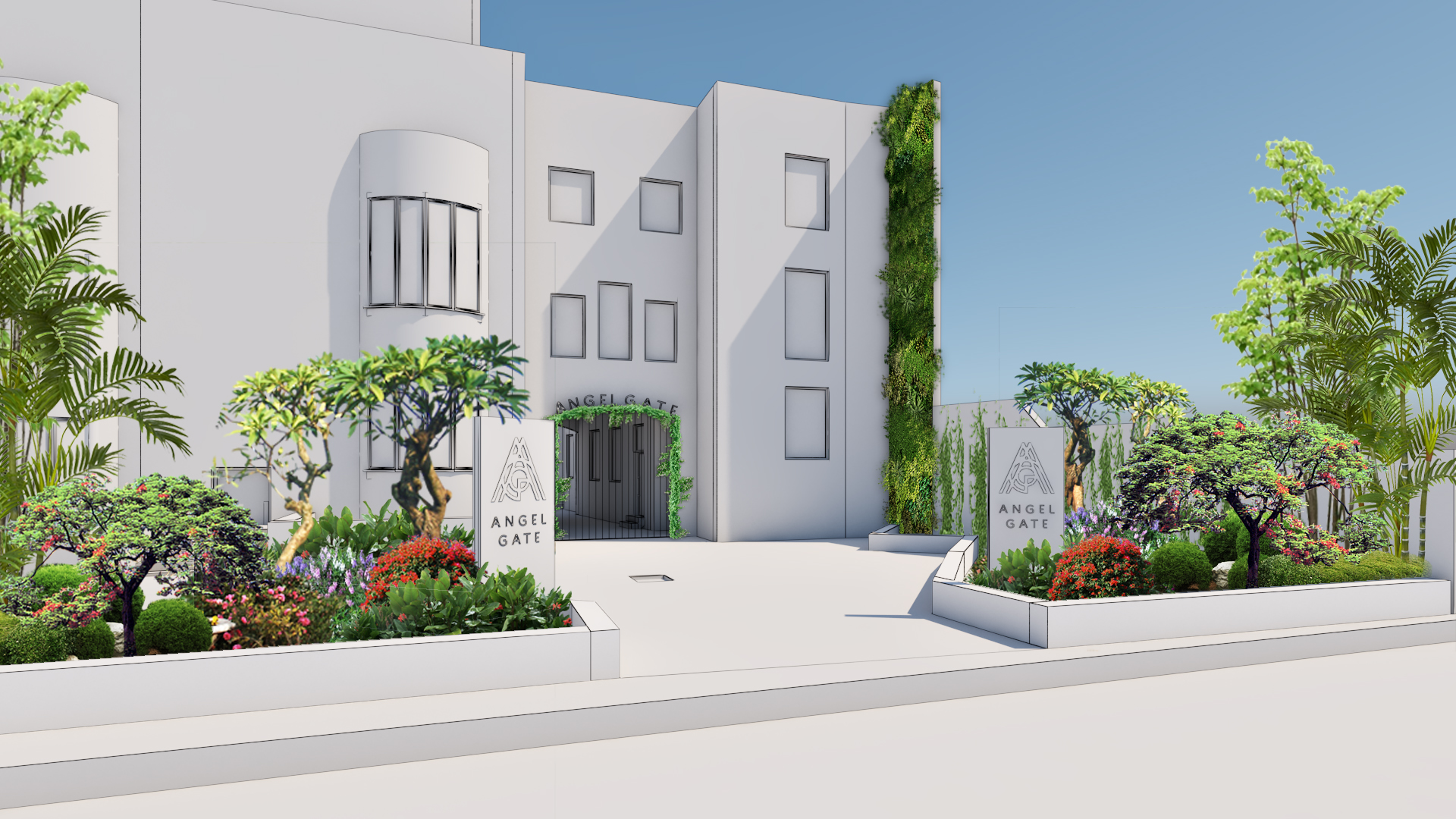 Modern white Angel Gate building with lush green landscaping and entrance