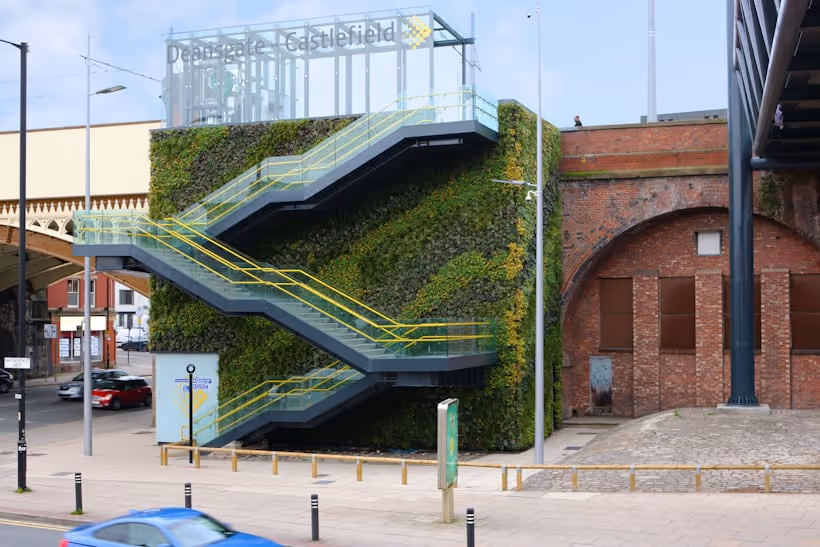 Living wall with yellow-edged stairs at Deansgate