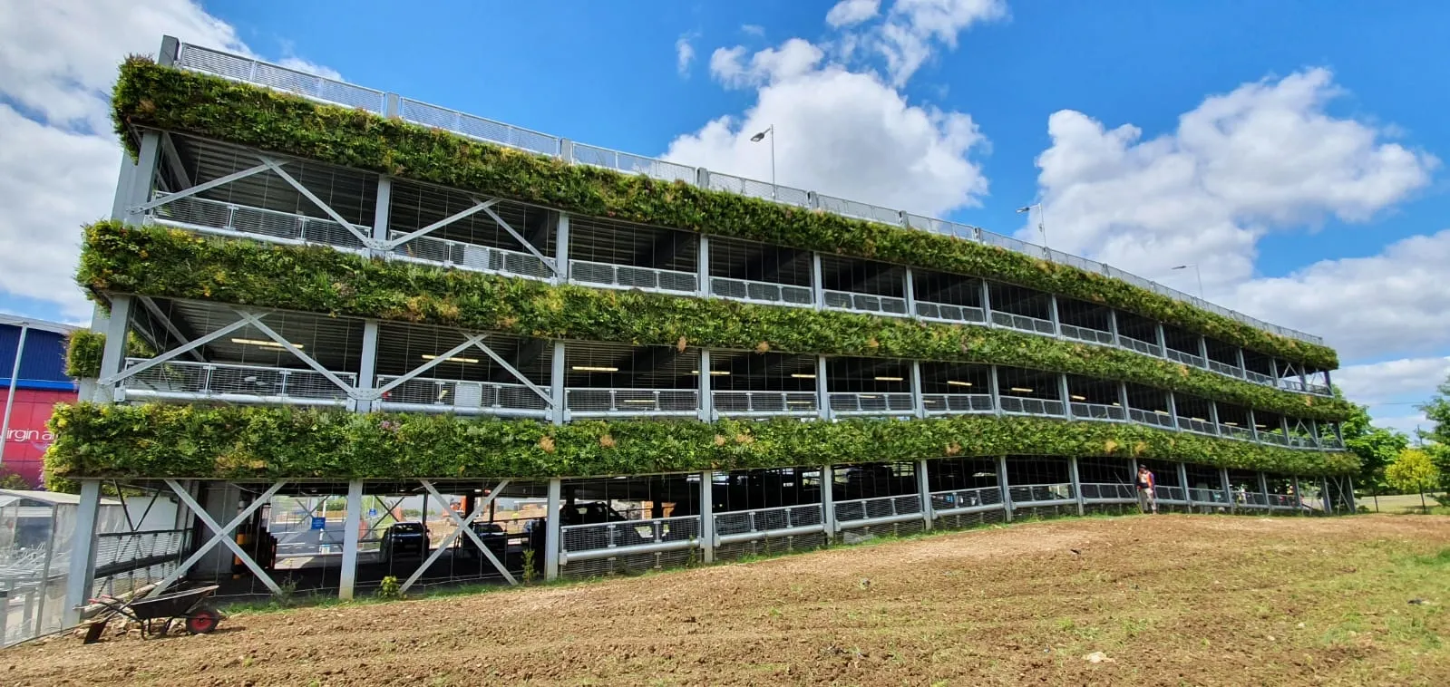 A 300m²+ living wall for a multi-storey car park, grown for 6 months at our nursery, enhancing biodiversity and counteracting pollution.