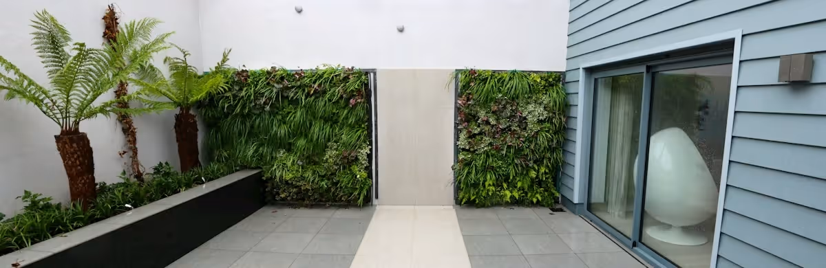 Bouilly House residence garden, showcasing a living wall