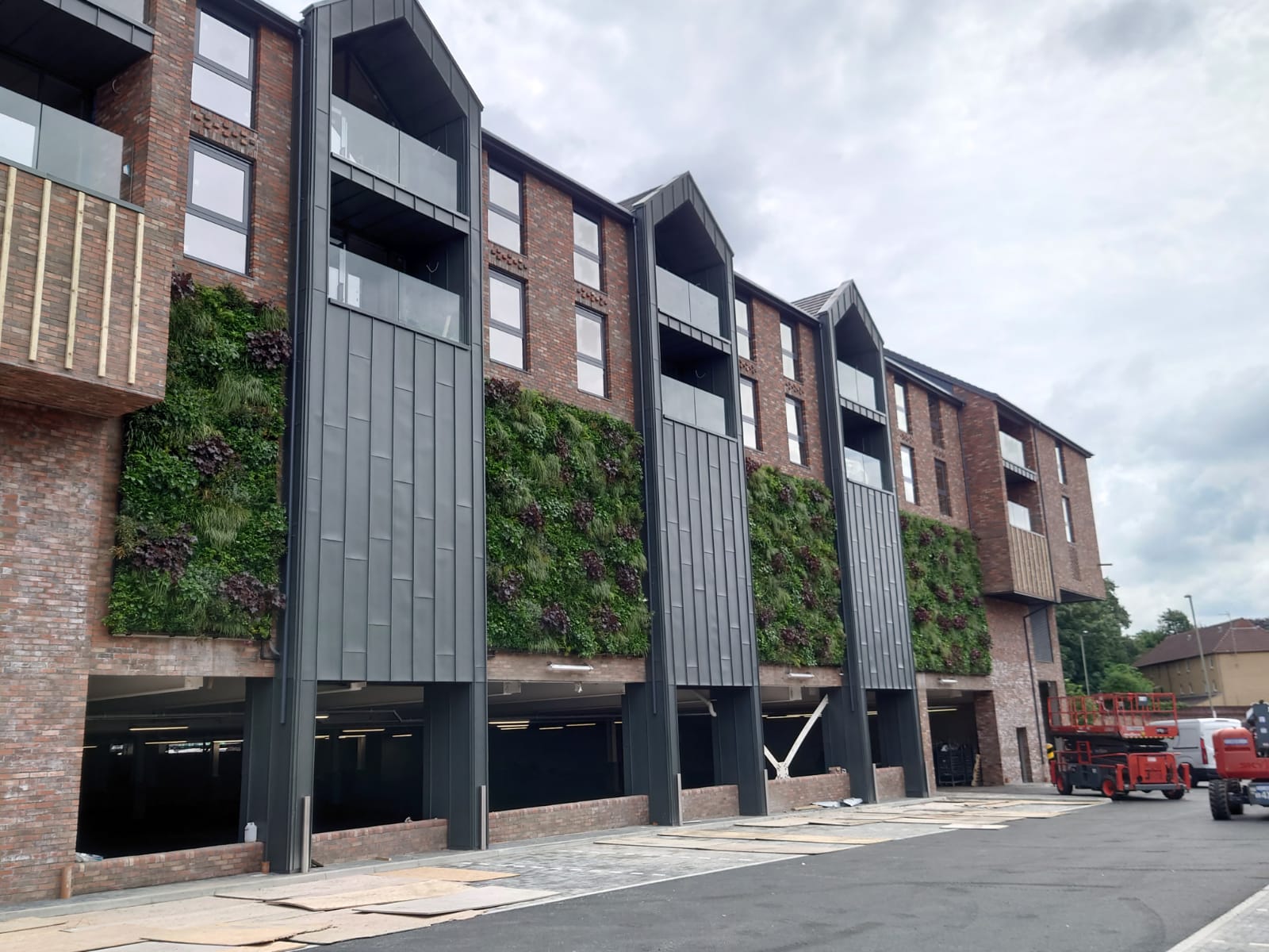 Exterior of Lidl Epsom, with living wall features