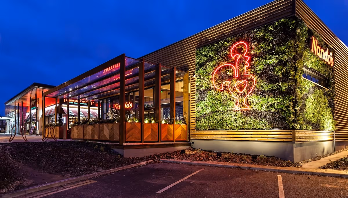 Nando's Cambridge: a striking living wall adds visual impact and a verdant backdrop, creating a huge living billboard for their brand.