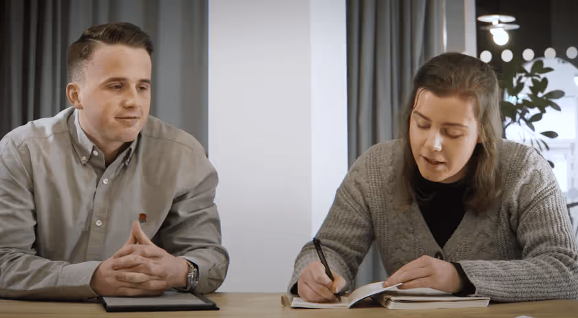 Two biodiversity net gain consultants reviewing a project's green infrastructure strategy