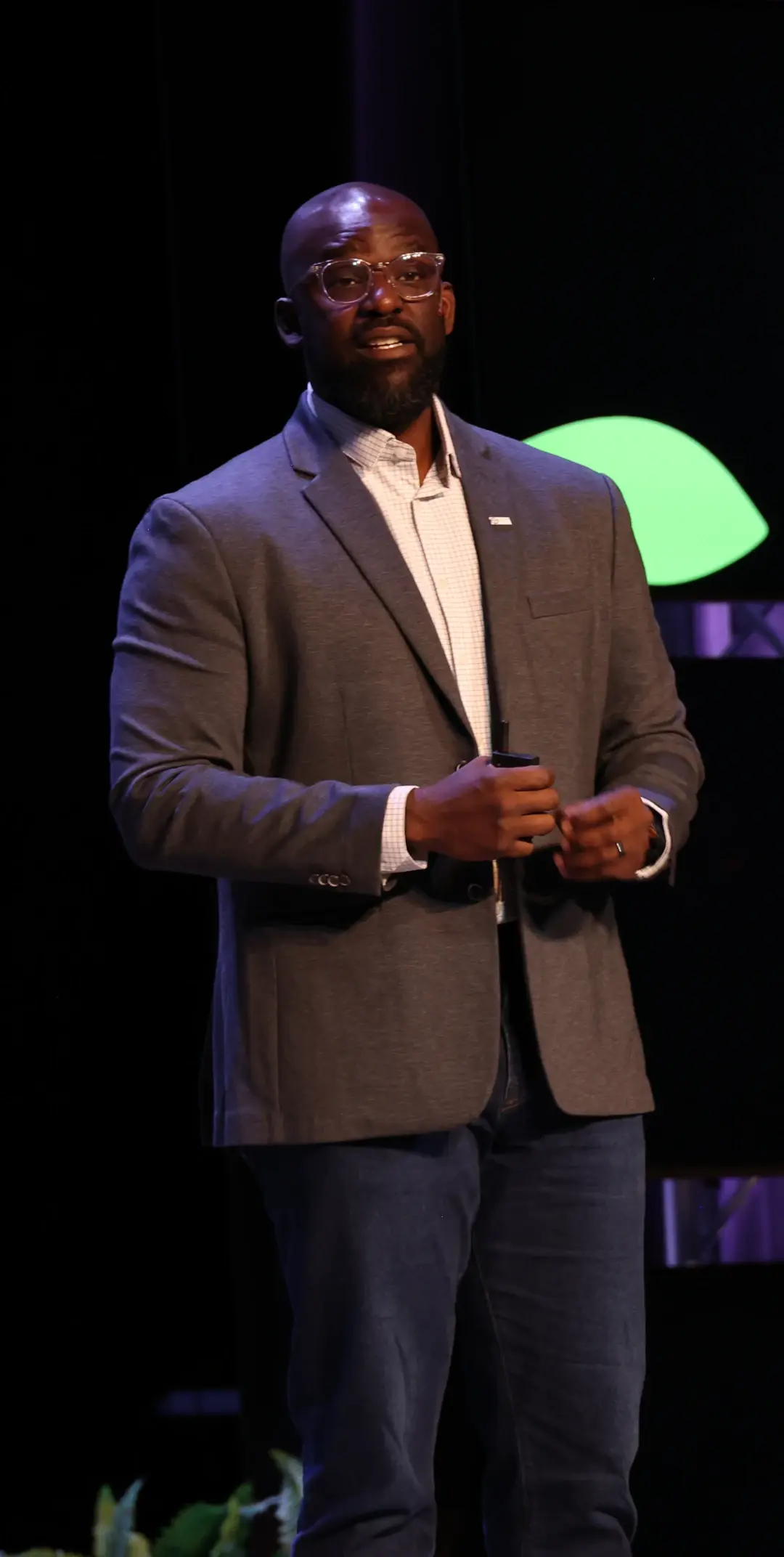 dan owolabi speaking on stage