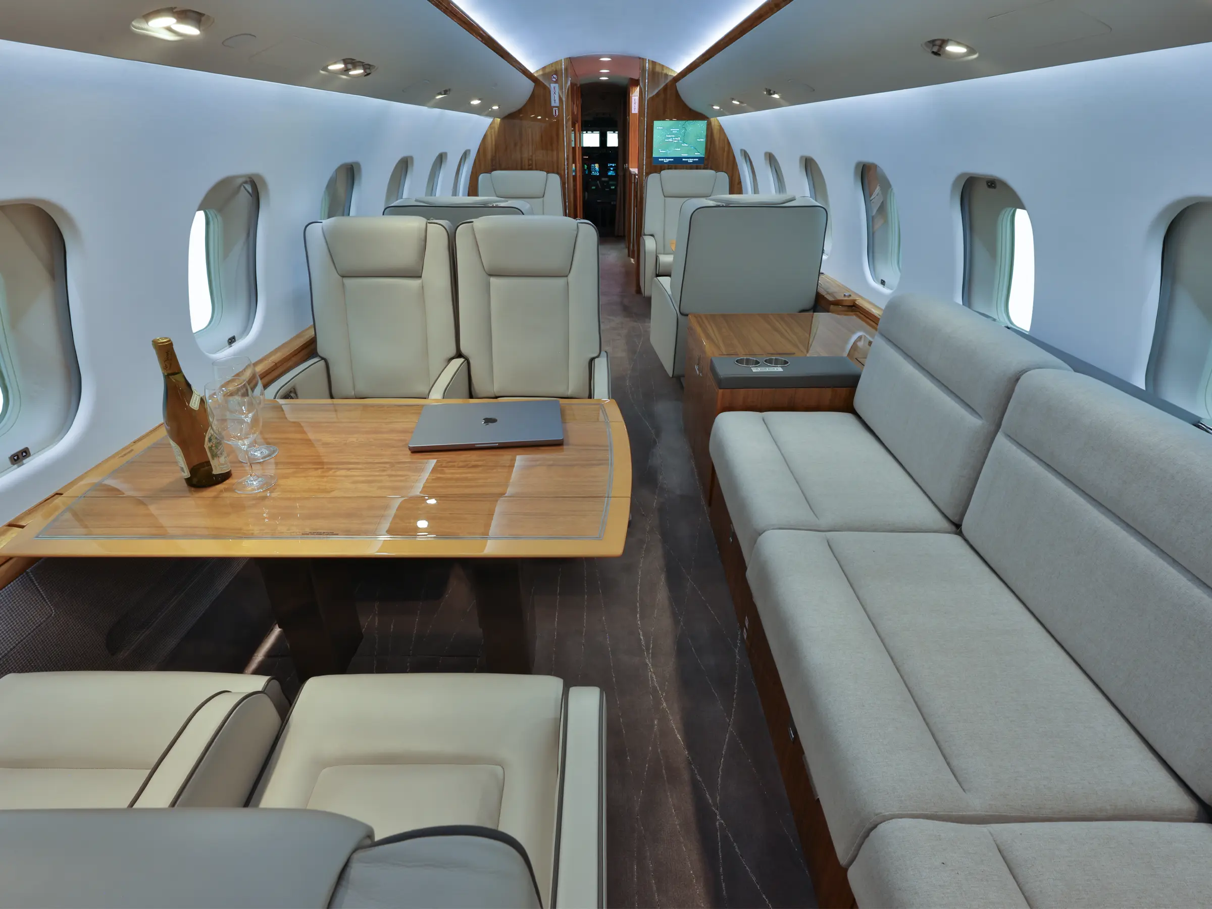 The main cabin of the Falcon 2000LX through the forward galley toward the cockpit