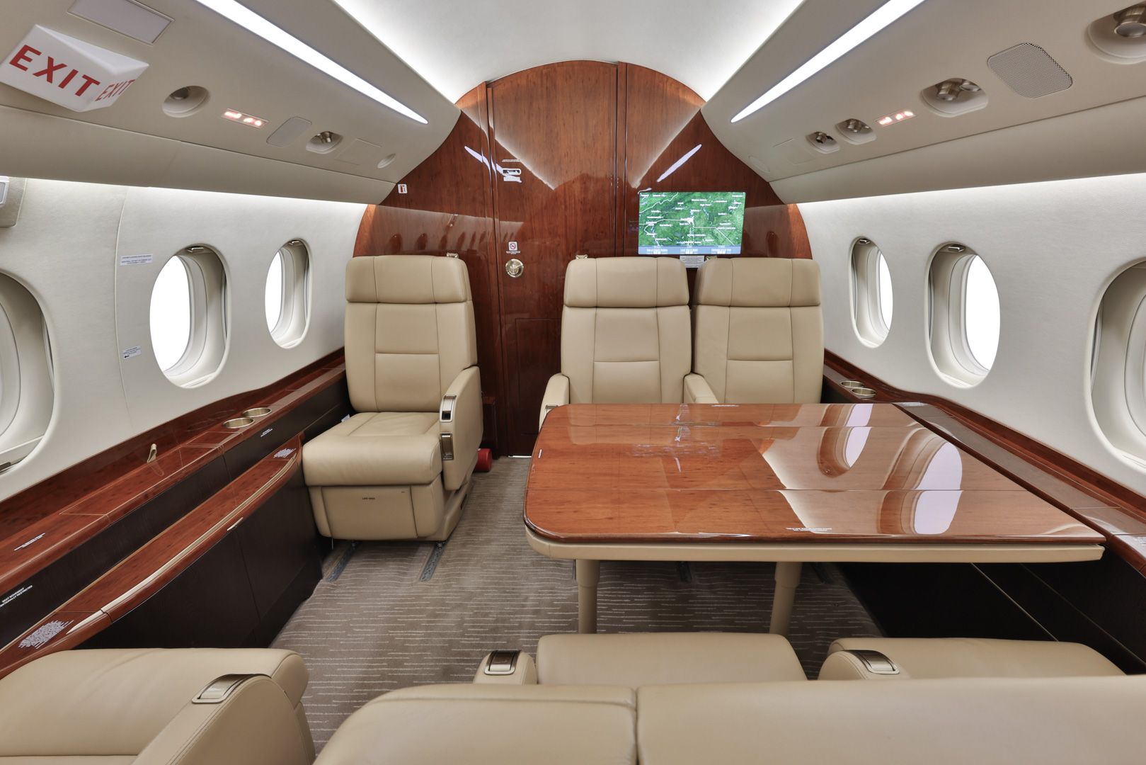 The main cabin of the Falcon 2000LX through the forward galley toward the cockpit
