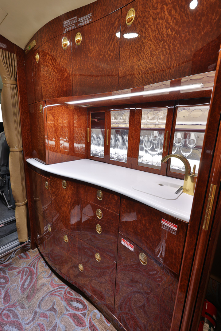 The main cabin of the Falcon 2000LX through the forward galley toward the cockpit