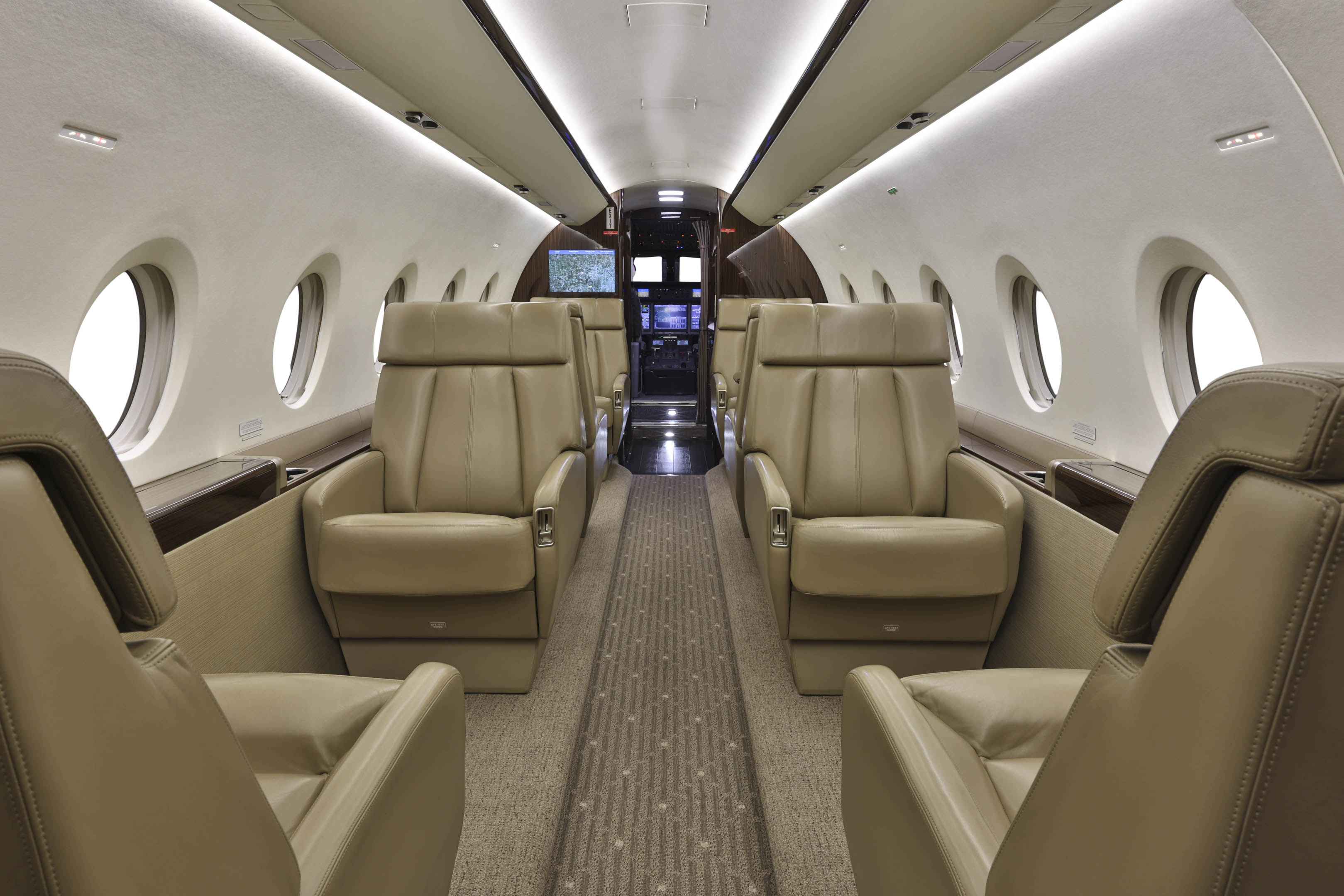 The main cabin of the Falcon 2000LX through the forward galley toward the cockpit