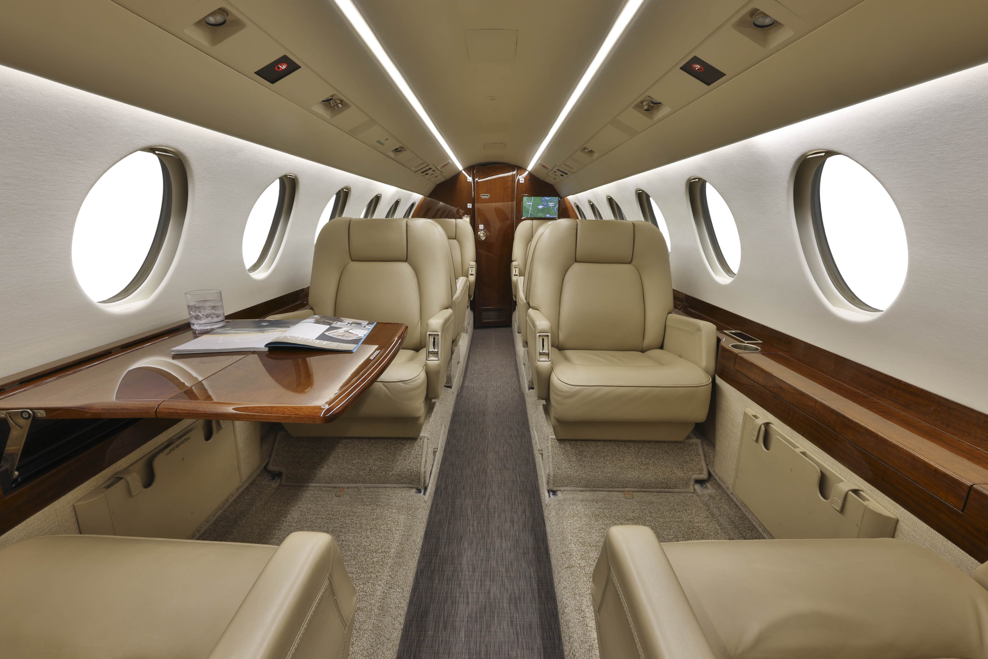 The main cabin of the Falcon 2000LX through the forward galley toward the cockpit