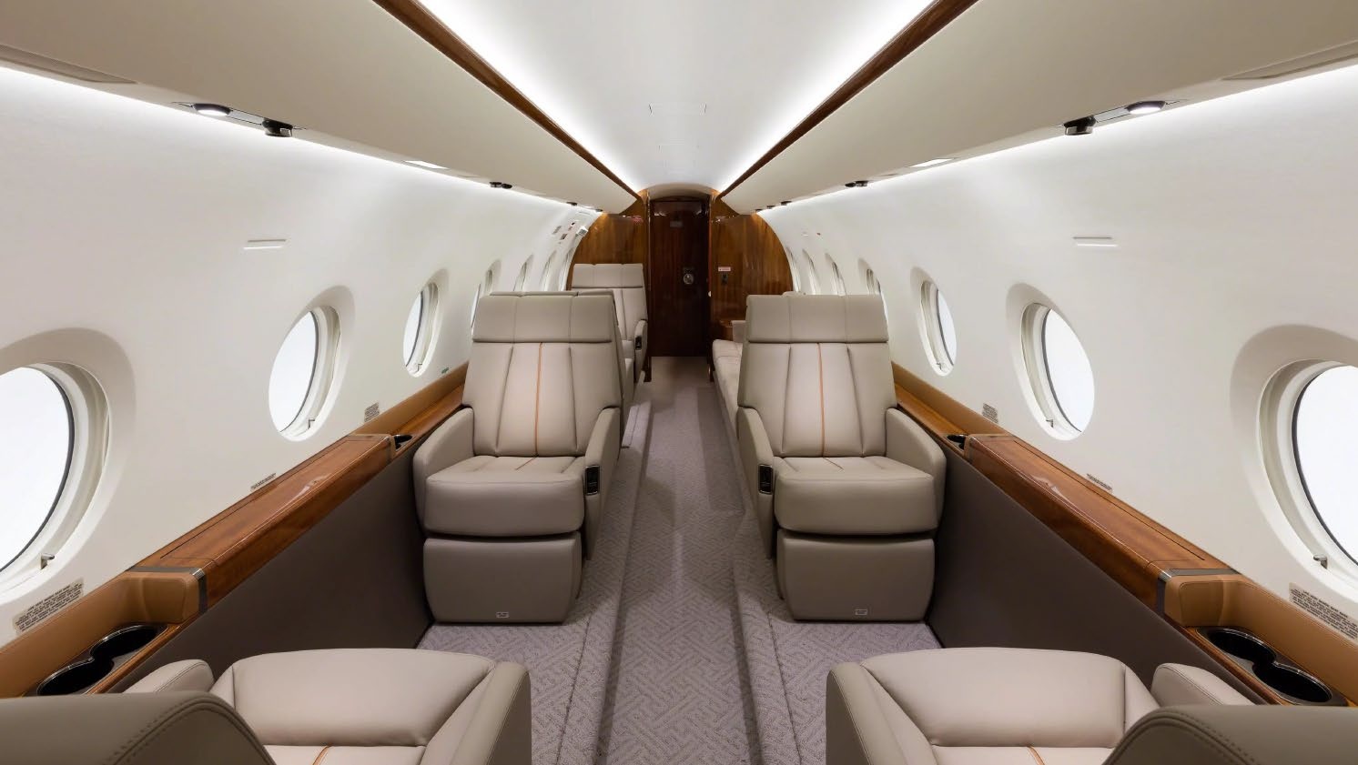 The main cabin of the Falcon 2000LX through the forward galley toward the cockpit