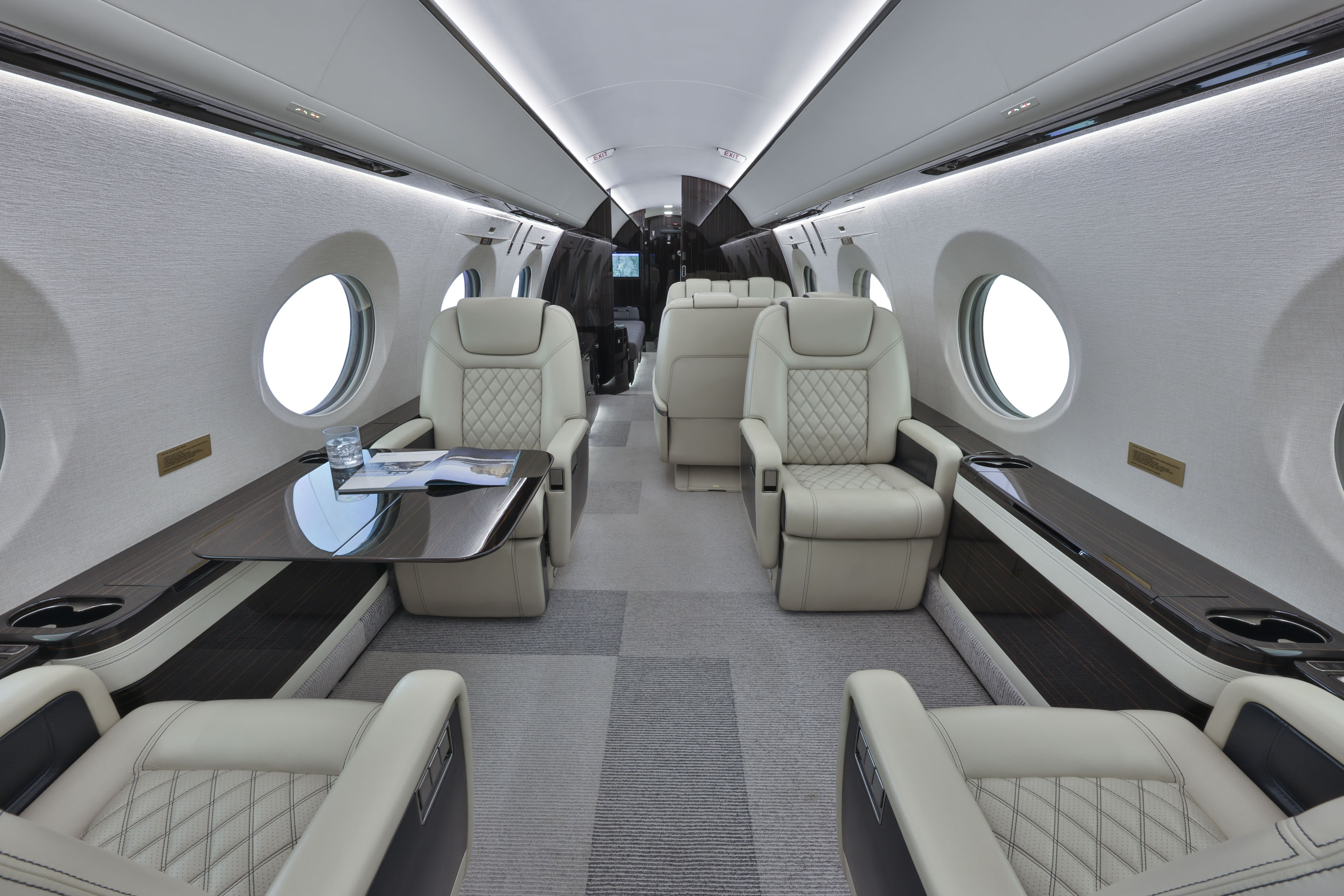 The main cabin of the Falcon 2000LX through the forward galley toward the cockpit