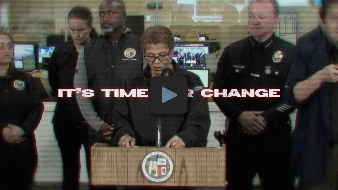 A press conference with officials standing behind a podium, with text on screen reading 'IT'S TIME FOR CHANGE'.