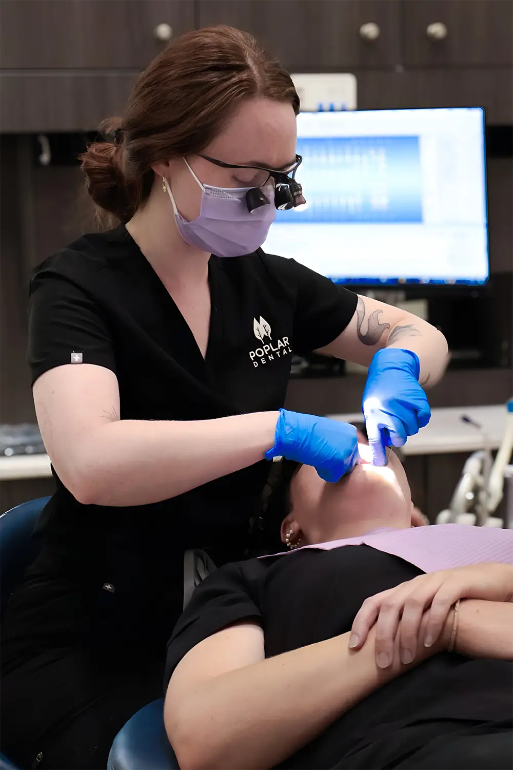 Image of a dental professional with a patient