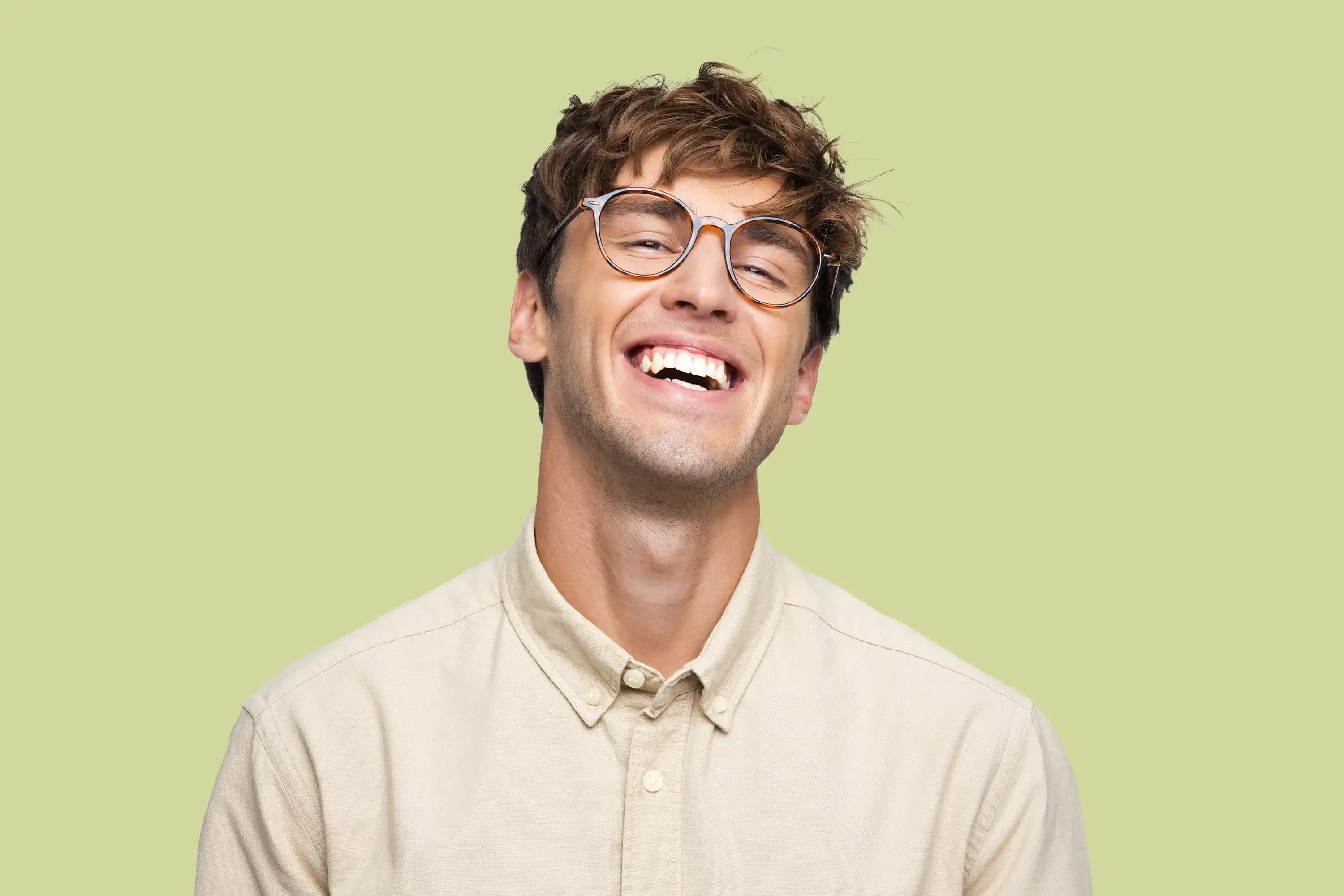 Man with glasses smiling