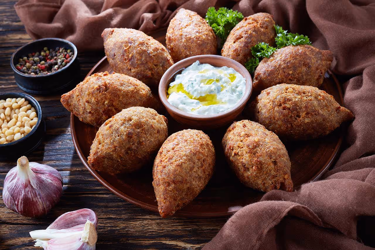 Fried balls Kebabhs and yougurt dressing