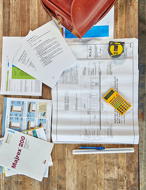 blueprints and documents on table