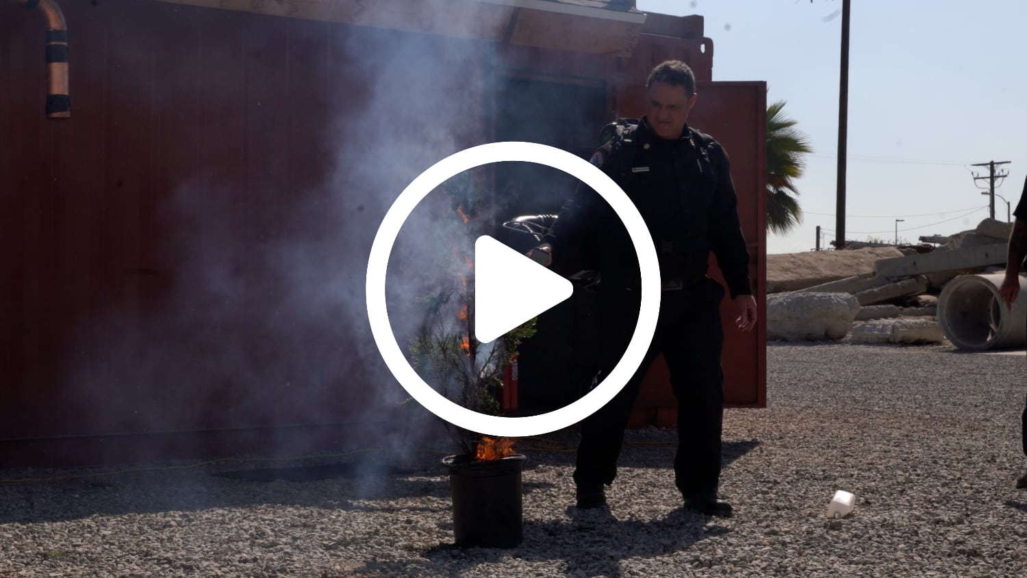 Preview thumbnail of video featuring Sonic Fire Tech fire suppression technology; a fireman is featured putting out a fire using the Sonic Fire Tech backpack unit