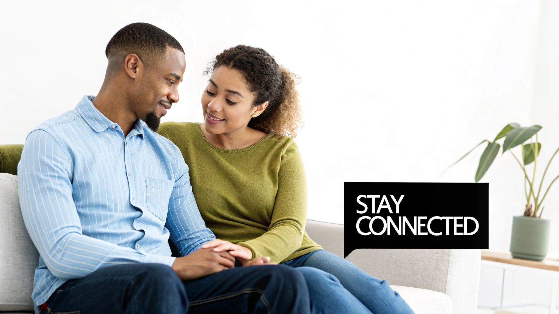 Two people holding hands for comfort