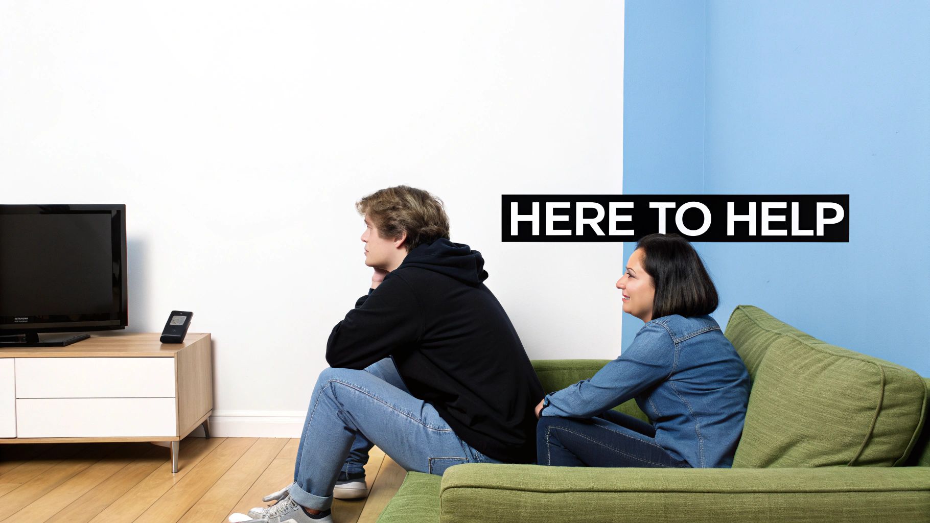 Woman offering comfort and support to distressed person sitting on floor with text here to help