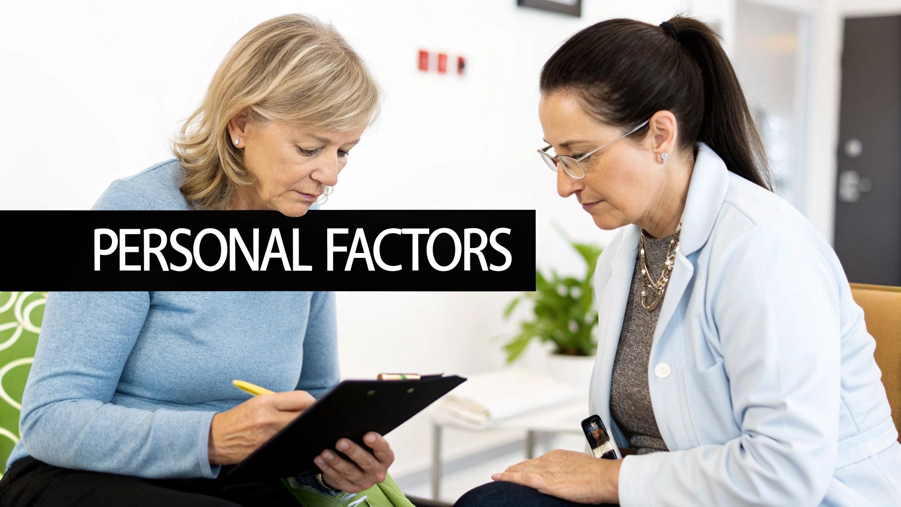 Two mature women discussing personal factors, one writing on a clipboard during a consultation.