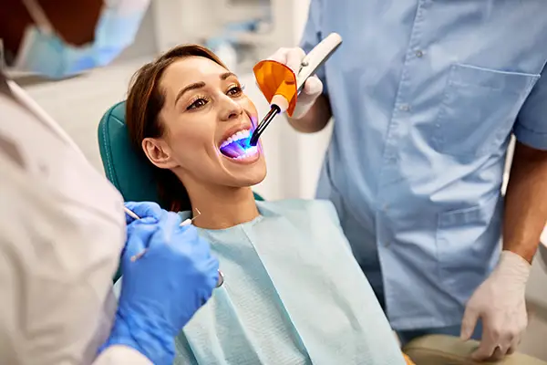 person getting checked out at the dentist